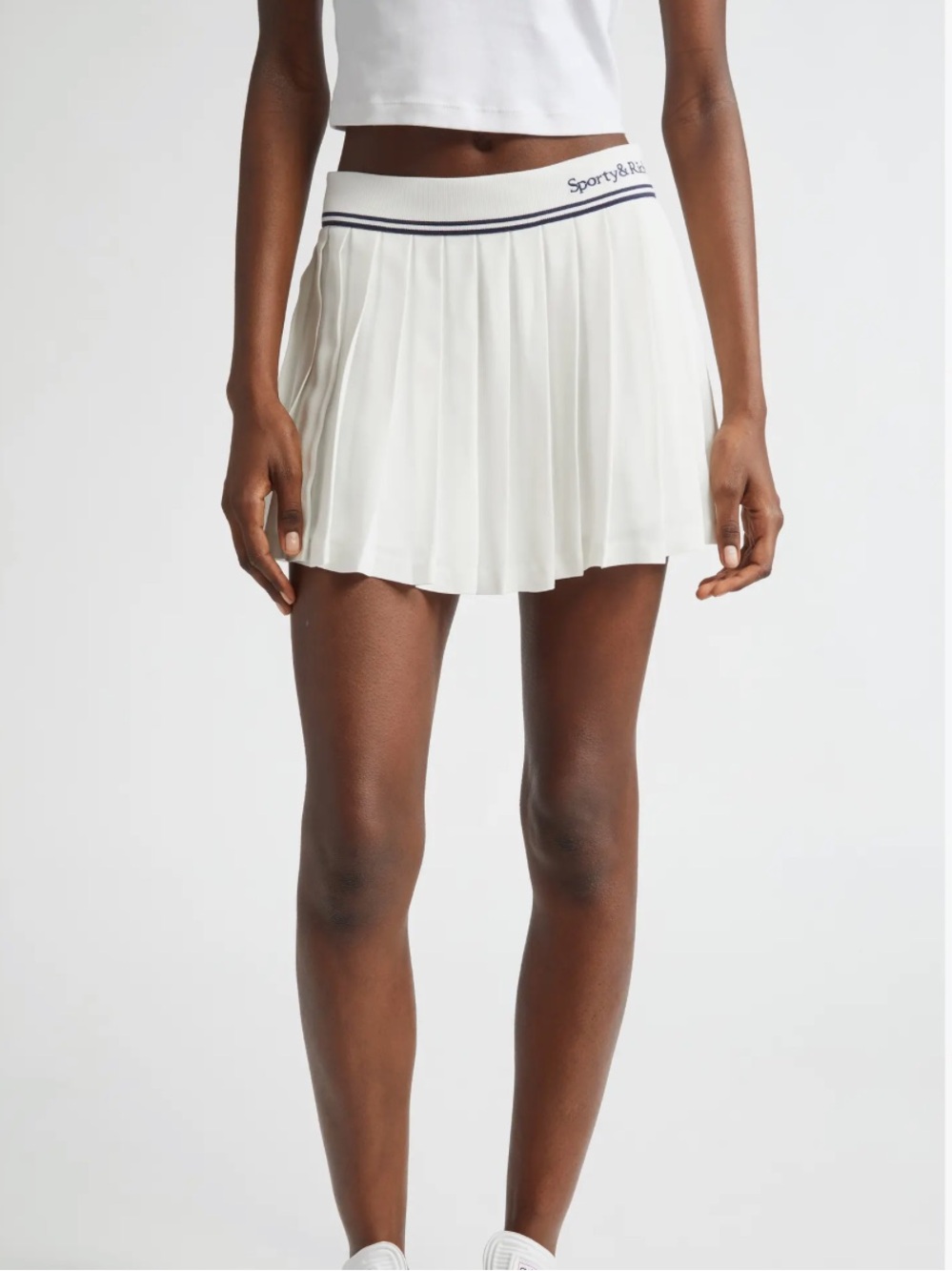 Sporty & Rich Cream Abigail Pleated Mini Skirt with Navy Trim